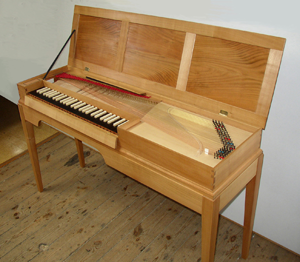 [Picture of fretted clavichord after Bodechtel in cherry-wood case]